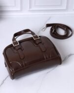 Chestnut Buckle Sling Bag in Brown, view 5
