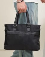 Embossed Laptop Bag with Sling Strap in Black, view 1