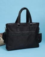 Embossed Laptop Bag with Sling Strap in Black, view 4