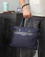 Embossed Laptop Bag with Sling Strap in Navy, view 1