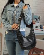 Jet Buckle-Strap Shoulder Bag in Black, view 1