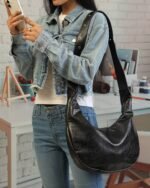 Jet Buckle-Strap Shoulder Bag in Black, view 2