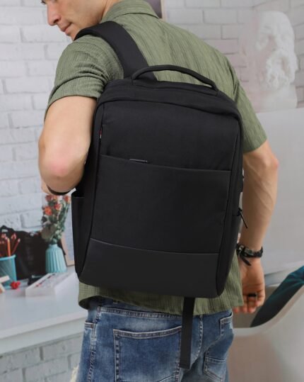 Panelled Laptop Backpack in Black, view 1