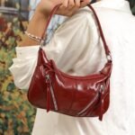 Rouge Textured Baguette Bag in Red, view 1