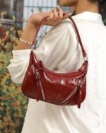 Rouge Textured Baguette Bag in Red, view 1
