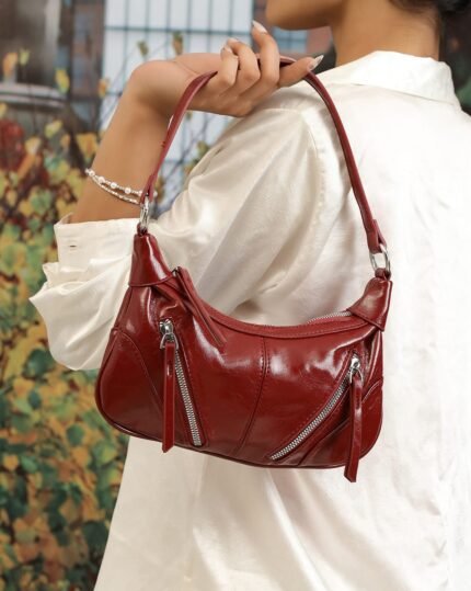 Rouge Textured Baguette Bag in Red, view 1