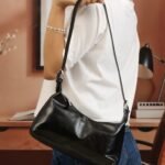 Sleek Baguette Bag with Sling Strap in Black, view 1