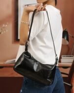Sleek Baguette Bag with Sling Strap in Black, view 1