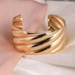 Twisted Ribbed Gold Cuff Bracelet, view 1